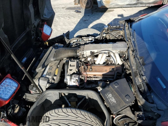 1990 Chevrolet Corvette z VIN 1G1YY3384L5111942, wystawiony jako Copart lot #75481214 z przebiegiem 91 731 mil mil oraz Szkoda całkowita • Salvage title. Historia ofert i sprzedaży dostępna na DreamBid. Obrazek 11.