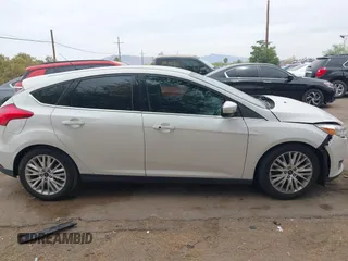 2016 Ford Focus Titanium with VIN 1FADP3N27GL319497, listed as a IAAI auction lot 42385359 with Not provided miles and . Bid and sale history available at DreamBid. Image 12.