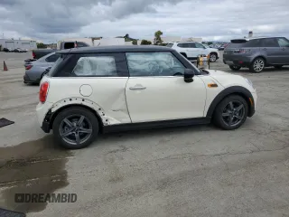 2016 MINI Hardtop with VIN WMWXP5C52G2D13922, listed as a Copart auction lot 54707815 with 47,625 mi miles and Salvage title. Bid and sale history available at DreamBid. Image 3.