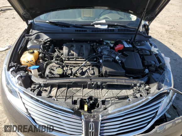 2015 Lincoln MKZ z VIN 3LN6L2JK1FR604092, wystawiony jako Copart lot #48379525 z przebiegiem 64 656 mil mil oraz Szkoda całkowita • Salvage title. Historia ofert i sprzedaży dostępna na DreamBid. Obrazek 12.