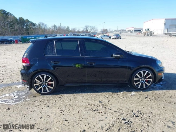 2014 Volkswagen GTI Driver's Edition with VIN WVWHD7AJXEW011230, listed as a IAAI auction lot 41600806 with 124,498 mi miles. Bid and sale history available at carsss.com. Image 13.