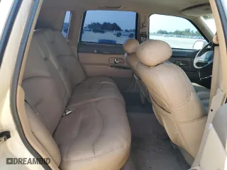 1997 Lincoln Town Car Signature with VIN 1LNLM82W9VY681894, listed as a Copart auction lot 71467034 with 129,142 mi miles and Salvage Title. Bid and sale history available at carsss.com. Image 10.