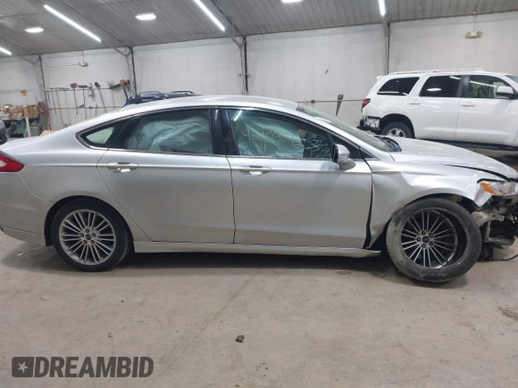 2014 Ford Fusion SE with VIN 3FA6P0H92ER284852, listed as a IAAI auction lot 42104842 with 103,295 mi miles. Bid and sale history available at carsss.com. Image 13.