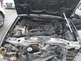 2004 Ford Ranger XL with VIN 1FTYR14U74PB60014, listed as a IAAI auction lot 42003581 with Not Provided miles and . Bid and sale history available at carsss.com. Image 10.