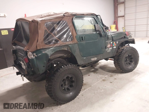 2000 Jeep Wrangler Sahara with VIN 1J4FA59S4YP788741, listed as a IAAI auction lot 41427876 with 209,434 mi miles. Bid and sale history available at carsss.com. Image 4.