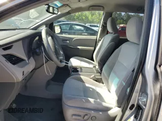 2016 Toyota Sienna LE AAS with VIN 5TDKK3DC5GS712181, listed as a Copart auction lot 53265915 with 142,472 mi miles and Salvage Title. Bid and sale history available at DreamBid. Image 7.