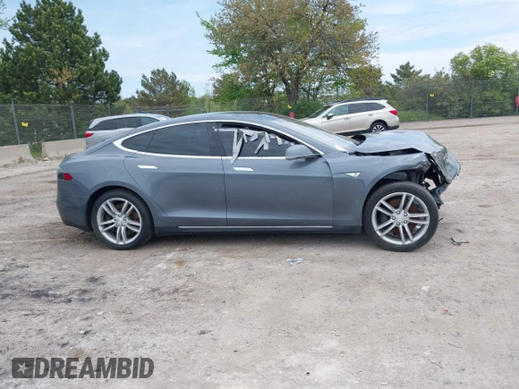 2013 Tesla Model S with VIN 5YJSA1CG9DFP27357, listed as a IAAI auction lot 42362514 with Not provided miles and . Bid and sale history available at DreamBid. Image 13.