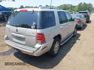 2004 Mercury Mountaineer with VIN 4M2DU86E34ZJ53426, listed as a IAAI auction lot 42410215 with 150,471 mi miles and . Bid and sale history available at DreamBid. Image 6.