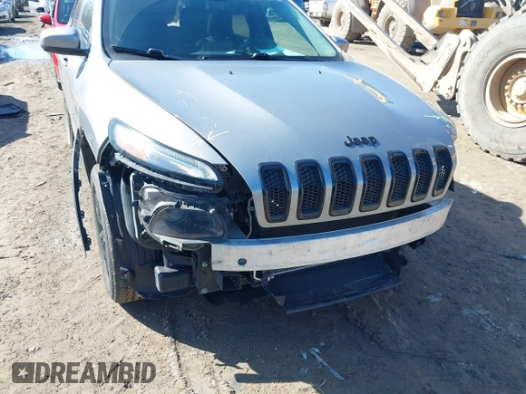 2014 Jeep Cherokee Latitude with VIN 1C4PJMCS7EW310179, listed as a IAAI auction lot 41757831 with 134,087 mi miles and . Bid and sale history available at DreamBid. Image 6.