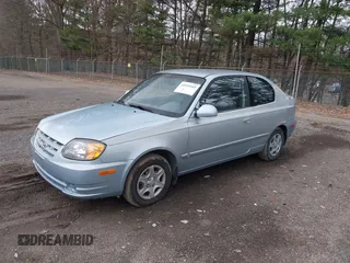 2005 Hyundai Accent GLS with VIN KMHCG35C85U354423, listed as a IAAI auction lot 41939445 with 134,952 mi miles. Bid and sale history available at carsss.com. Image 2.