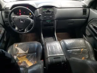 2003 Honda Pilot EX z VIN 2HKYF18553H583289, wystawiony jako Copart lot #57672315 z przebiegiem 227 984 mil mil oraz Czysty tytuł • Clean title. Historia ofert i sprzedaży dostępna na DreamBid. Obrazek 8.