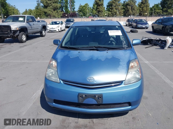 2007 Toyota Prius z VIN JTDKB20U177621010, wystawiony jako IAAI lot #42565535 z przebiegiem 205 692 mil mil oraz . Historia ofert i sprzedaży dostępna na DreamBid. Obrazek 6.
