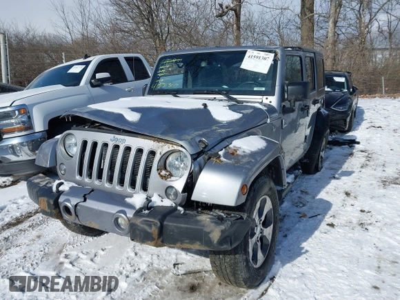2018 Jeep Wrangler JK Unlimited Sahara with VIN 1C4HJWEG9JL801714, listed as a IAAI auction lot 41591307 with 79,201 mi miles. Bid and sale history available at carsss.com. Image 2.