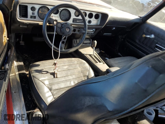1975 Pontiac Firebird z VIN 2U87S5N582923, wystawiony jako Copart lot #72821784 z przebiegiem 37 718 mil mil oraz Czysty tytuł • Clean title. Historia ofert i sprzedaży dostępna na DreamBid. Obrazek 8.