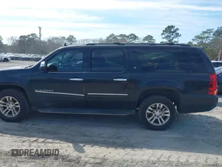 2013 Chevrolet Suburban LT with VIN 1GNSCJE07DR147780, listed as a IAAI auction lot 41666746 with 260,020 mi miles and . Bid and sale history available at DreamBid. Image 14.