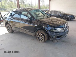 2021 Volkswagen Tiguan S with VIN 3VV0B7AX1MM098300, listed as a IAAI auction lot 42574636 with 53,559 mi miles and . Bid and sale history available at DreamBid. Image 1.