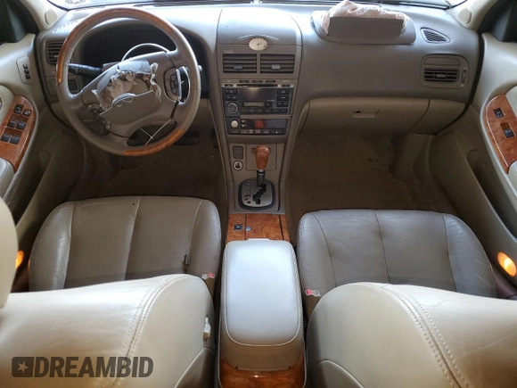 2002 Infiniti I35 Luxury z VIN JNKDA31A22T022606, wystawiony jako Copart lot #55158005 z przebiegiem 136 847 mil mil oraz Szkoda całkowita • Salvage title. Historia ofert i sprzedaży dostępna na DreamBid. Obrazek 8.