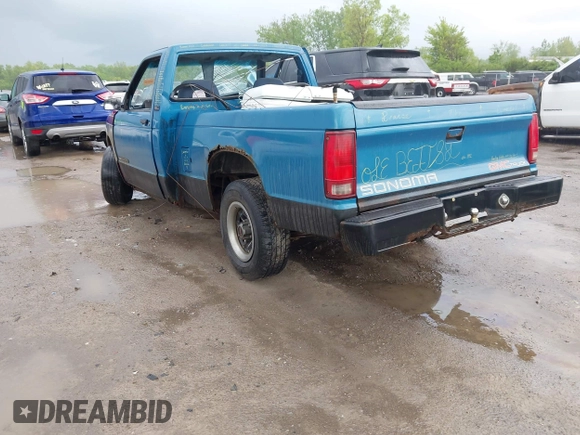 1992 GMC Sonoma z VIN 1GTCS14A9N8529102, wystawiony jako IAAI lot #42268788 z przebiegiem 83 781 mil mil oraz . Historia ofert i sprzedaży dostępna na DreamBid. Obrazek 3.