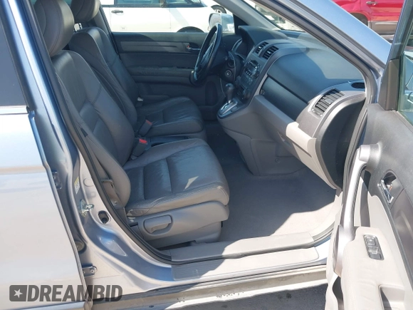 2009 Honda CR-V EX-L with VIN JHLRE38719C001393, listed as a IAAI auction lot 41884431 with 186,677 mi miles and . Bid and sale history available at carsss.com. Image 5.