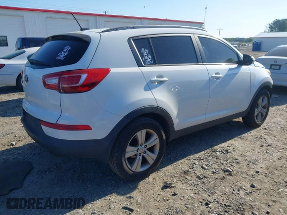 2013 Kia Sportage LX with VIN KNDPB3A25D7538328, listed as a IAAI auction lot 41989605 with 101,064 mi miles. Bid and sale history available at carsss.com. Image 4.
