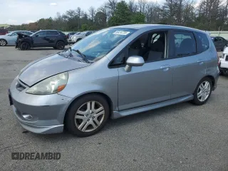 2007 Honda Fit Sport with VIN JHMGD386X7S037082, listed as a Copart auction lot 66434735 with 128,800 mi miles and Salvage title. Bid and sale history available at DreamBid. Image 1.