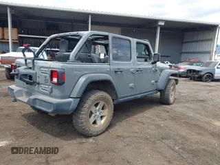 2021 Jeep Wrangler Unlimited Willys with VIN 1C4HJXDGXMW763324, listed as a IAAI auction lot 41643296 with 22,599 mi miles and . Bid and sale history available at DreamBid. Image 4.