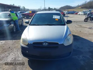 2007 Hyundai Accent GS with VIN KMHCM36C97U043769, listed as a IAAI auction lot 41526011 with 230,566 mi miles. Bid and sale history available at carsss.com. Image 12.