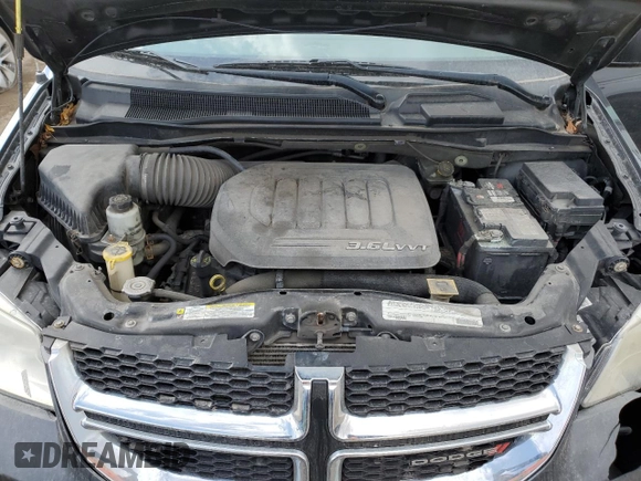 2012 Dodge Grand Caravan SE with VIN 2C4RDGBG5CR397651, listed as a Copart auction lot 52878905 with 248,103 mi miles and Clean Title. Bid and sale history available at DreamBid. Image 12.