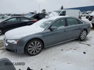 2016 Audi A8 3.0T with VIN WAU34AFD8GN009296, listed as a Copart auction lot 87642945 with 53,933 mi miles and Clean Title. Bid and sale history available at DreamBid. Image 1.