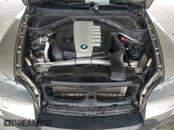 2010 BMW X5 35d z VIN 5UXFF0C58ALJ99362, wystawiony jako Copart lot #51952755 z przebiegiem 182 124 mil mil oraz Szkoda całkowita • Salvage title. Historia ofert i sprzedaży dostępna na DreamBid. Obrazek 12.
