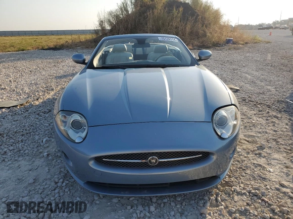 2007 Jaguar XK with VIN SAJWA44BX75B09612, listed as a Copart auction lot 75139114 with 86,094 mi miles and Salvage Title. Bid and sale history available at carsss.com. Image 5.
