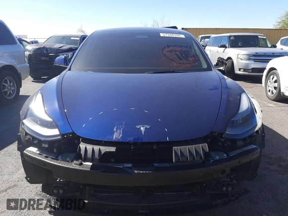 2023 Tesla Model 3 with VIN 5YJ3E1EA5PF652212, listed as a Copart auction lot 57348395 with 8,780 mi miles and Salvage title. Bid and sale history available at DreamBid. Image 5.