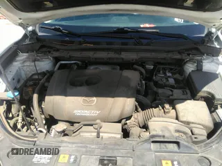 2014 Mazda CX-5 Touring with VIN JM3KE2CY7E0364311, listed as a IAAI auction lot 42108176 with 90,506 mi miles and . Bid and sale history available at DreamBid. Image 10.