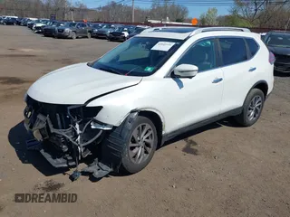 2016 Nissan Rogue SL with VIN 5N1AT2MV0GC755778, listed as a IAAI auction lot 42042335 with 201,371 mi miles and . Bid and sale history available at DreamBid. Image 2.
