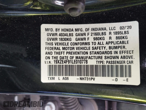 2020 Honda Insight Touring with VIN 19XZE4F91LE010778, listed as a IAAI auction lot 41430937 with 29,454 mi miles and . Bid and sale history available at carsss.com. Image 9.