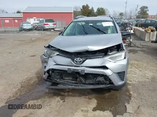 2016 Toyota RAV4 LE with VIN 2T3BFREV8GW432986, listed as a IAAI auction lot 41716530 with 143,442 mi miles. Bid and sale history available at carsss.com. Image 18.