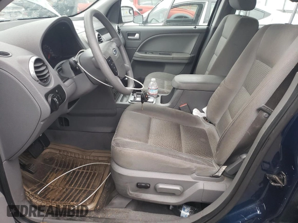 2005 Ford Freestyle SE with VIN 1FMZK01155GA11367, listed as a Copart auction lot 43059165 with 168,759 mi miles and Salvage Title. Bid and sale history available at carsss.com. Image 7.