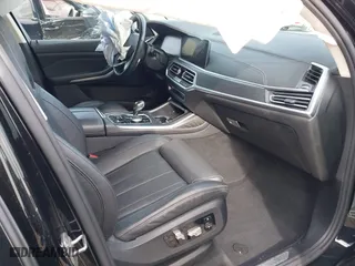 2021 BMW X7 xDrive40i with VIN 5UXCW2C08M9E57046, listed as a IAAI auction lot 41601223 with 43,988 mi miles. Bid and sale history available at carsss.com. Image 5.