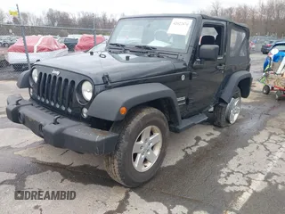 2014 Jeep Wrangler Sport with VIN 1C4AJWAG9EL312856, listed as a IAAI auction lot 42022870 with 98,323 mi miles and . Bid and sale history available at DreamBid. Image 17.