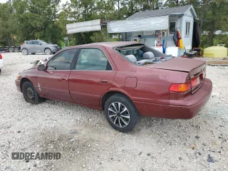2000 Toyota Camry CE z VIN 4T1BG22K3YU649970, wystawiony jako Copart lot #55654425 z przebiegiem 220 076 mil mil oraz Szkoda całkowita • Salvage title. Historia ofert i sprzedaży dostępna na DreamBid. Obrazek 2.