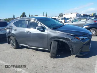 2023 Lexus NX 250 z VIN 2T2ADCAZXPC003877, wystawiony jako IAAI lot #41593097 z przebiegiem 14 597 mil mil oraz . Historia ofert i sprzedaży dostępna na DreamBid. Obrazek 13.