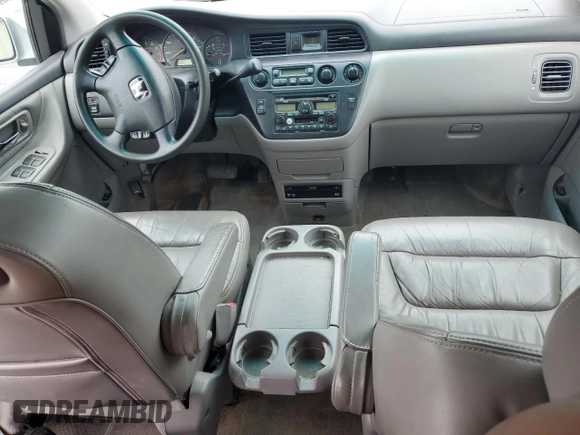 2004 Honda Odyssey EX-L with VIN 5FNRL18044B069774, listed as a Copart auction lot 57096535 with 165,307 mi miles and Salvage title. Bid and sale history available at DreamBid. Image 8.