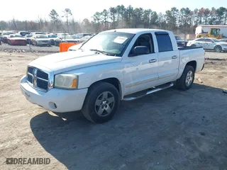 2005 Dodge Dakota Laramie with VIN 1D7HE58N95S138915, listed as a IAAI auction lot 41789883 with 342,402 mi miles. Bid and sale history available at carsss.com. Image 2.