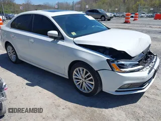 2015 Volkswagen Jetta SE z VIN 3VWD07AJ8FM284756, wystawiony jako IAAI lot #42038453 z przebiegiem 127 112 mil mil oraz . Historia ofert i sprzedaży dostępna na DreamBid. Obrazek 1.