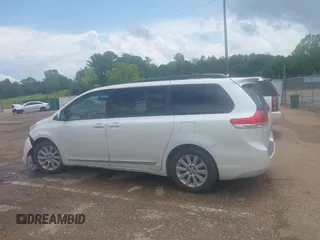 2014 Toyota Sienna XLE with VIN 5TDYK3DC2ES517663, listed as a IAAI auction lot 42171862 with 143,447 mi miles and . Bid and sale history available at DreamBid. Image 14.