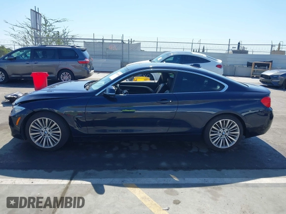 2016 BMW 4 Series 428i with VIN WBA3N7C59GK227052, listed as a IAAI auction lot 41643344 with 69,503 mi miles and . Bid and sale history available at carsss.com. Image 13.