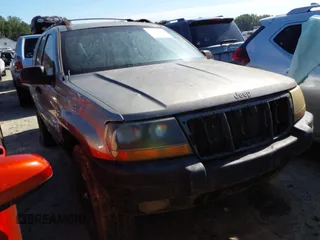 1999 Jeep Grand Cherokee Laredo with VIN 1J4GW58S0XC678864, listed as a IAAI auction lot 37593033 with Not provided miles and . Bid and sale history available at DreamBid. Image 1.