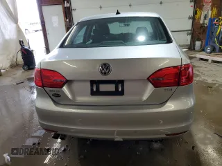 2014 Volkswagen Jetta TDI w/Premium with VIN 3VW3L7AJ3EM310892, listed as a Copart auction lot 61235765 with 242,970 mi miles and Salvage title. Bid and sale history available at DreamBid. Image 6.