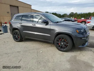 2015 Jeep Grand Cherokee SRT with VIN 1C4RJFDJ5FC796987, listed as a Copart auction lot 43536125 with 81,977 mi miles and Salvage Title. Bid and sale history available at carsss.com. Image 4.