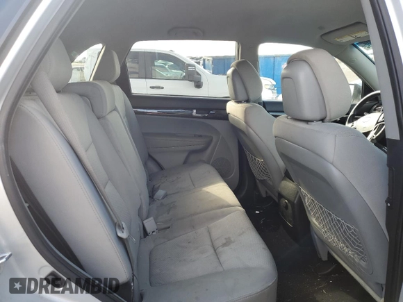 2012 Kia Sorento LX with VIN 5XYKT3A63CG300487, listed as a Copart auction lot 42238505 with 169,756 mi miles and Salvage Title. Bid and sale history available at DreamBid. Image 10.